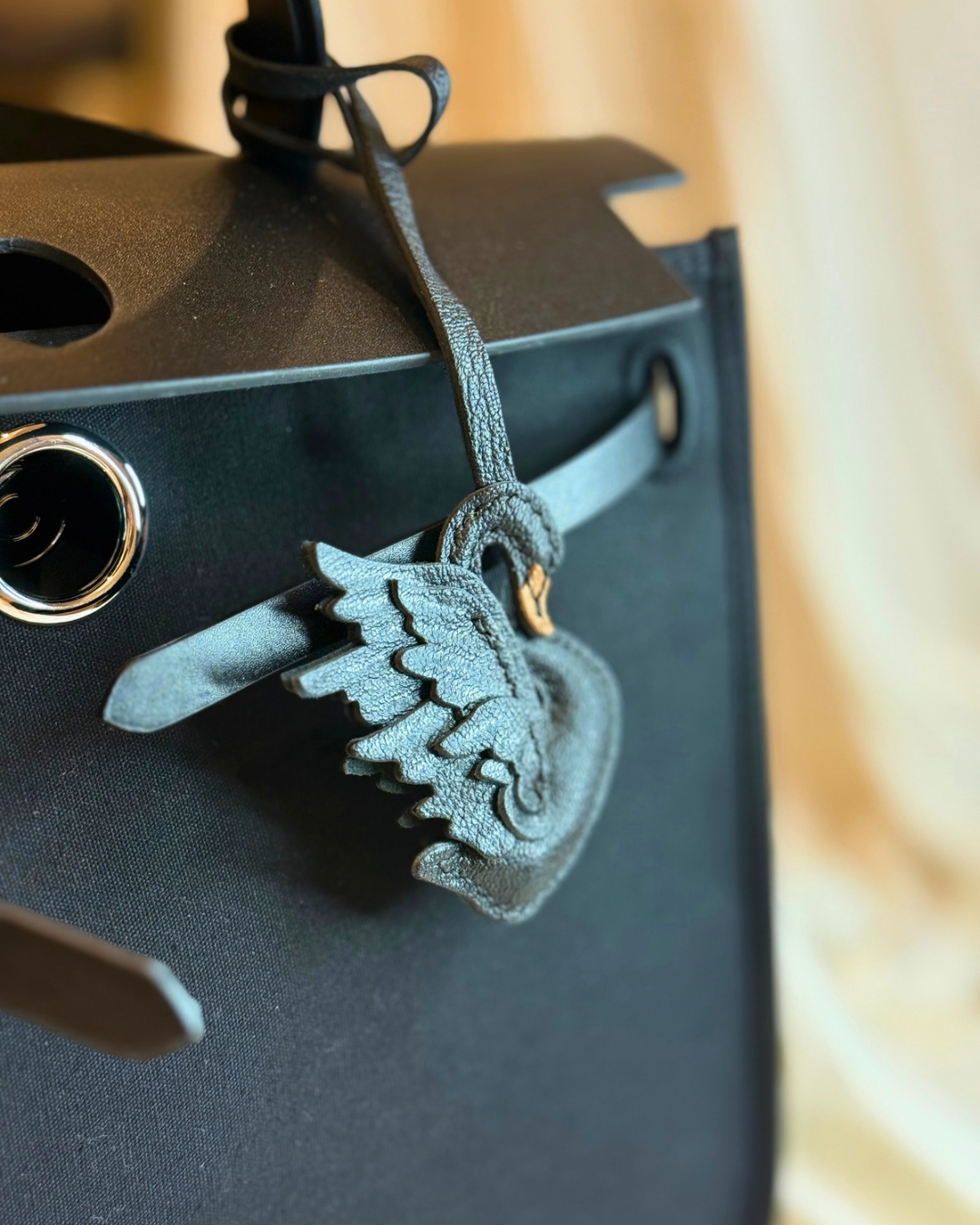Black swan leather bag charm