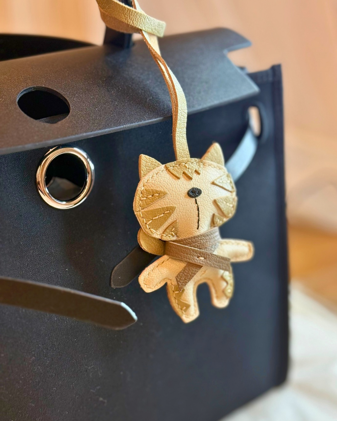White cat leather bag charm
