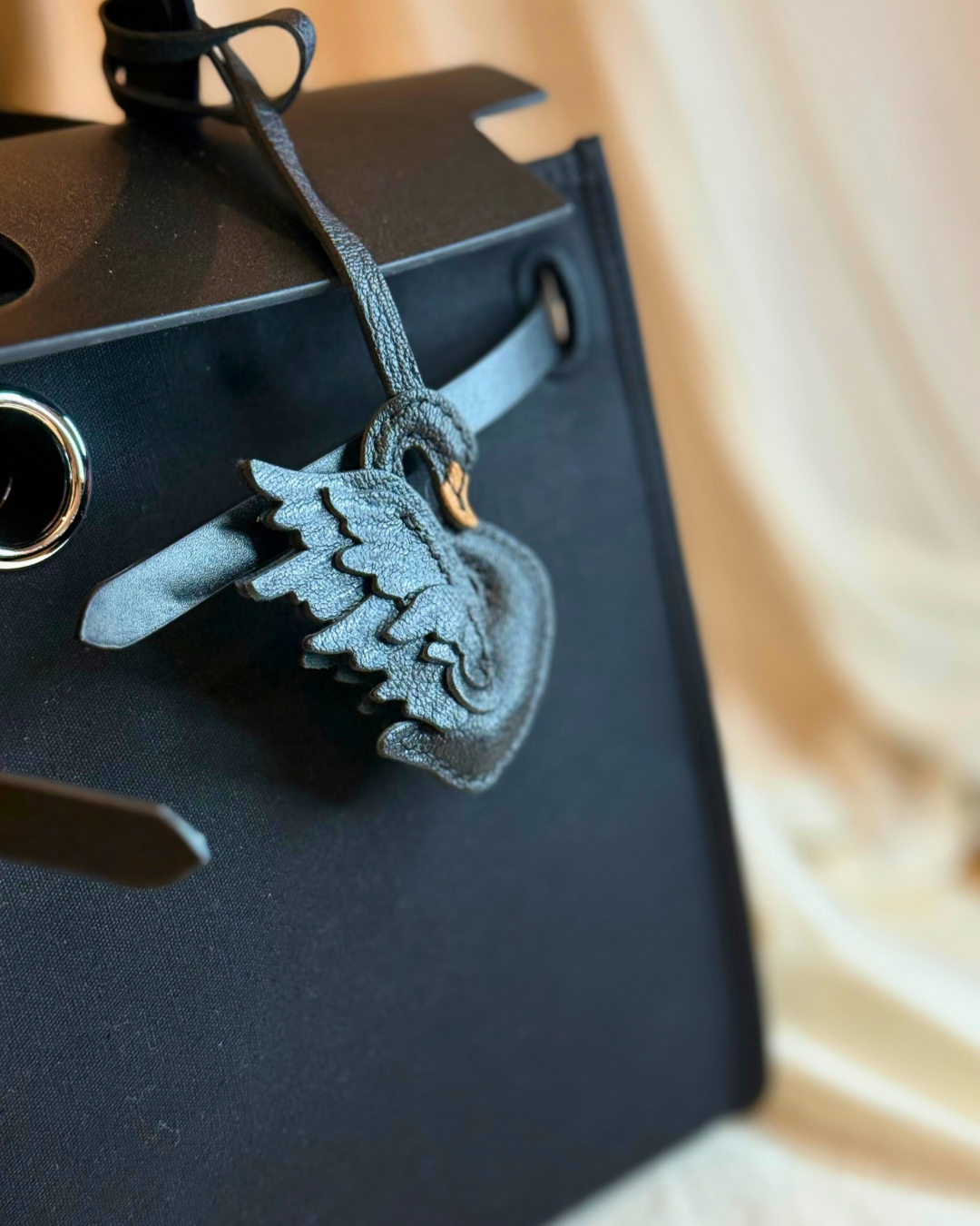 Black swan leather bag charm